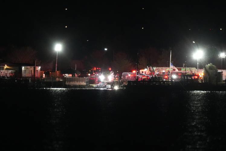 A view of emergency response looking from Arlington, Va., south of Ronald Reagan Washington National Airport, across the Potomac River toward the District of Columbia, Wednesday, Jan. 29, 2025. (AP Photo/Alex Brandon)
