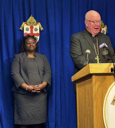 The Diocese of Springfield has named Shaina Rodriguez, left, as executive director of its Catholic Charities program. She was introduced to the community by  Bishop William Byrne, speaking.  