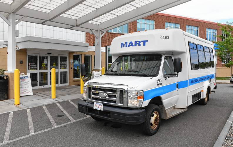 A Montachusett Regional Transit Authority bus picks up passengers at the Athol Hospital in Athol.