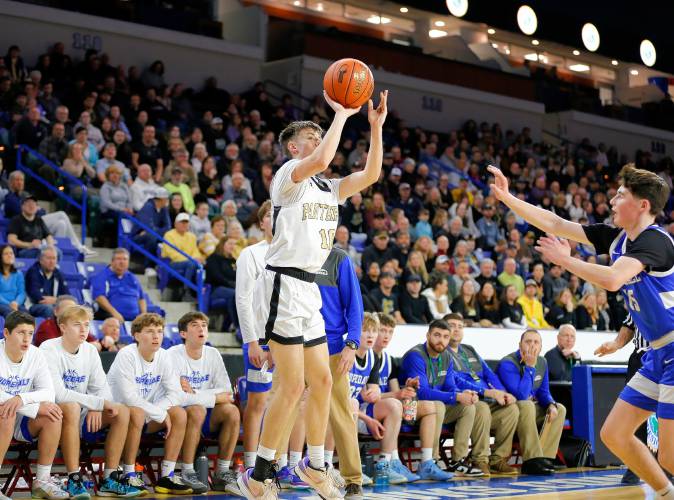 Pioneer’s Brayden Thayer (10) takes a three-pointer against Hopedale in the second quarter of the MIAA Div. 5 state championship Saturday at the Tsongas Center in Lowell. 