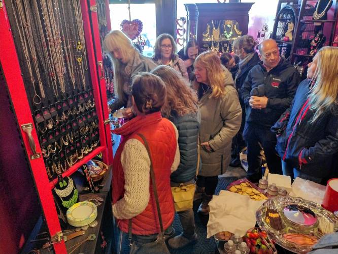 Friends, family and local officials perusing the items now available at The Menagerie Jewelry & Gift Shop, 74 Front Street, Winchendon.