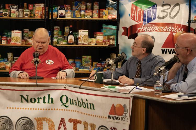 The North Quabbin Food-A-Thon, a 12-hour community fundraiser supporting local food pantries, marked its 22nd year last week. The event was broadcast on AOTV Channel 1301 and WVAO 105.9 FM. Buddy Oborne (left) donated $300 to this year’s drive.